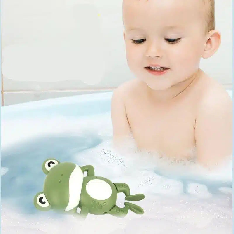 Les trois grenouilles de bain rose bleu et vert